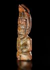 A RUSSET JADE SITTING FIGURE WEARING A PIG DRAGON ON IT'S HEAD, CHIN, HONGSHAN CULTURE