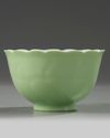 A Chinese pale-green glazed moulded 'floral' bowl