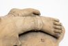 A soft paste light brown figure of a reclining farm girl