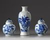 A pair of Chinese blue and white 'ladies' jars and covers and a 'figural' vase
