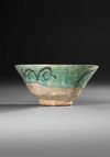 A KASHAN TURQUOISE AND BLACK POTTERY BOWL, PERSIA, 12TH-13TH CENTURY