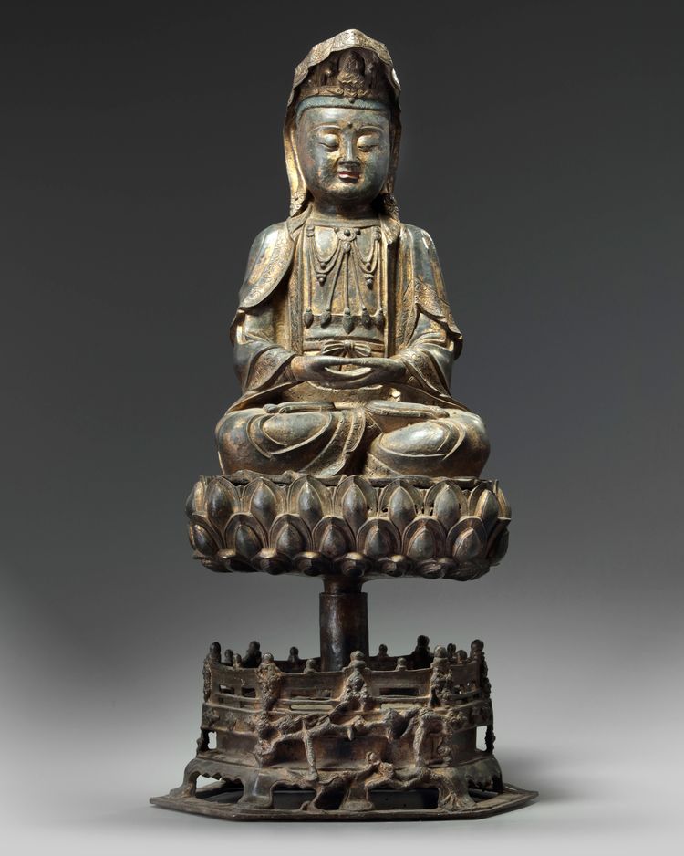 A CHINESE GILT-LACQUERED BRONZE FIGURE AVALOKITESVARA 