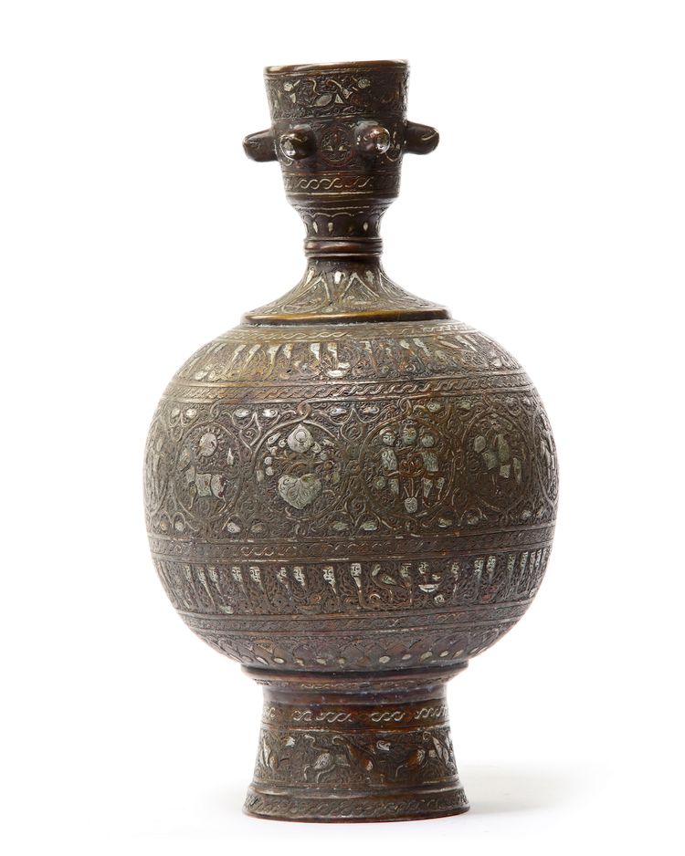A KHORASSAN STYLE INLAID BRONZE VASE, 19TH CENTURY