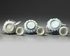 THREE CHINESE MOULDED TEAPOTS AND COVERS, KANGXI PERIOD (1662-1722)