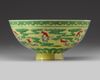 A Chinese yellow and green-enamelled 'bat' bowl with polychrome details
