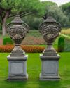 A PAIR OF LARGE SCULPTED CLASSIC GARDEN URNS WITH LID, 20TH CENTURY