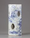 A blue and white hat stand