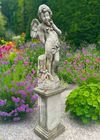A COMPOSTION STONE GARDEN STATUE OF AMOR ON A LIMESTONE PEDESTAL, LATE 20TH CENTURY