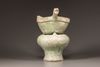 A GREEN-GLAZED RED POTTERY MODEL OF A YI, A LADLE AND BRAZIER, HAN DYNASTY (206 BC - 220 AD)