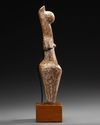 AN AMLASH TERRACOTTA STEATOPHYGOUS FIGURE, CIRCA EARLY 1ST MILLENIUM B.C.
