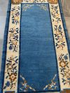 A CHINESE WOOL PEKING RUG, 20TH CENTURY