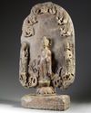 A large Chinese stone stele Buddhist triad