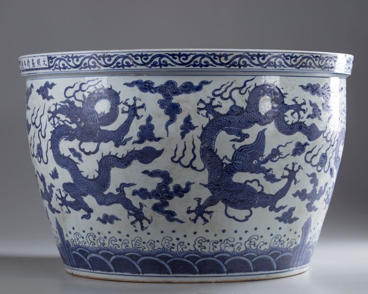 A massive Chinese blue and white 'nine dragons' jardiniere