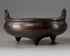 A Chinese bronze tripod censer