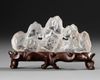 A CHINESE ROCK CRYSTAL BRUSH REST, 19TH CENTURY