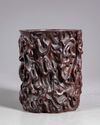 A Chinese wooden brush pot