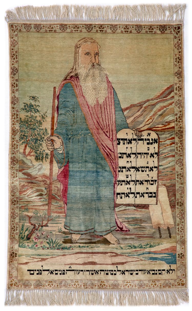 A CARPET WITH JUDEIKA INSCRIPTION AND MOSES.CA 1920