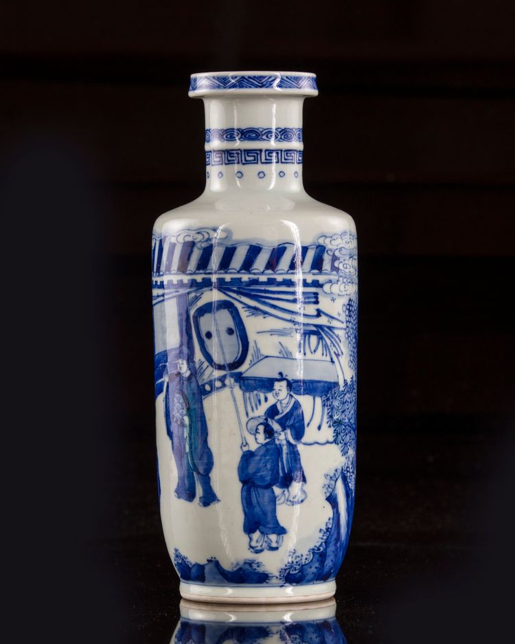 A small Chinese blue and white 'figural' rouleau vase