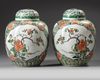 A PAIR OF CHINESE FAMILLE VERTE GINGER JARS AND COVERS
