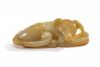 A Chinese celadon jade carving of a dog
