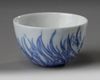 A small Chinese blue and white 'orchid' cup