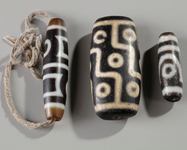 Three Tibetan Dzi beads