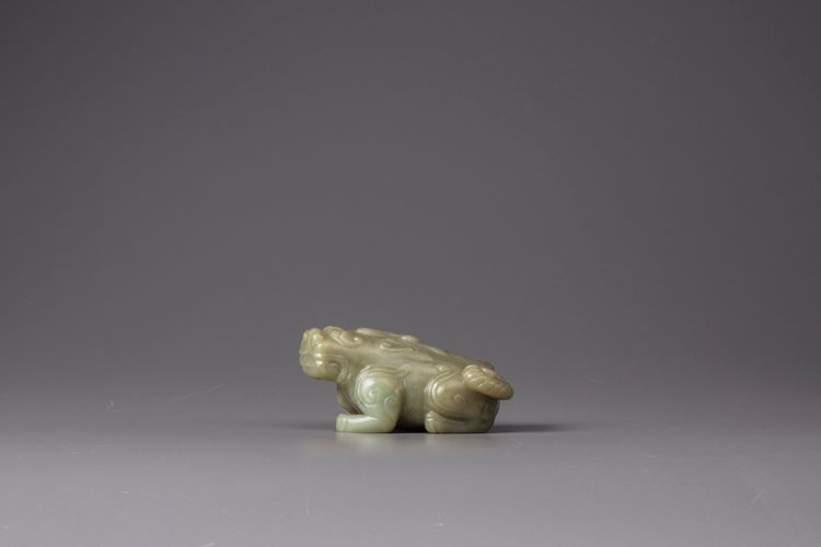 A celadon jade carving of a qilin