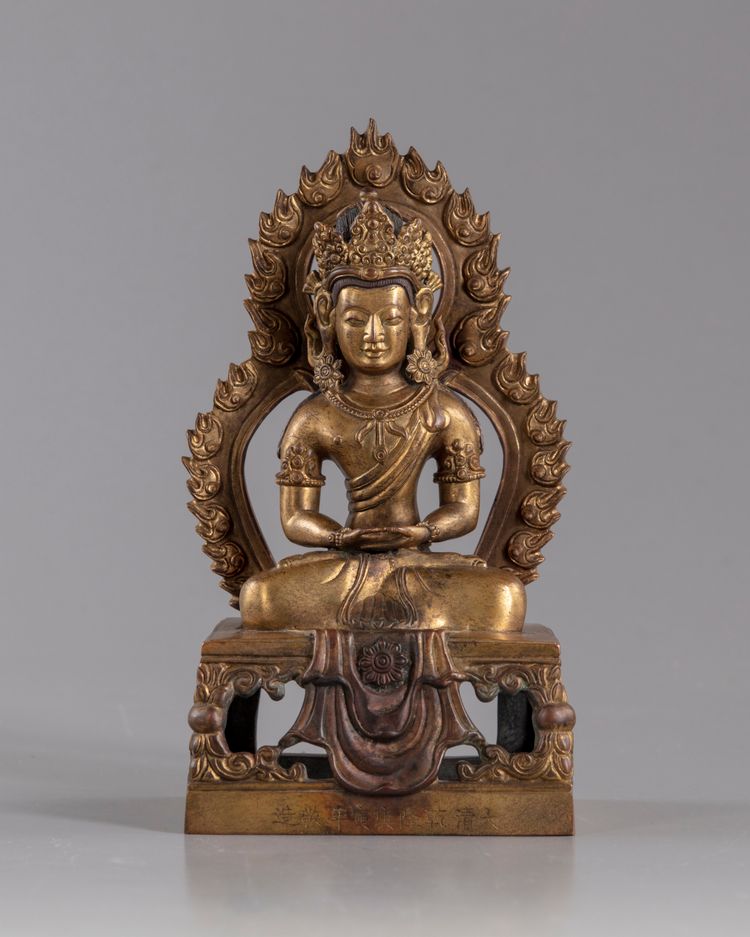 A gilt bronze figure of amitayus