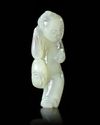 A CHINESE JADE CARVED FIGURE