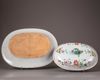 A Chinese famille rose tureen, cover, and stand