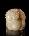 A CHINESE JADE JAR OF A WINGED MAN, WESTERN HAN DYNASTY  (206 BC–9 AD)