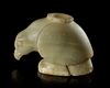 A NEAR EASTERN GREENISH CALCITE VESSEL IN THE SHAPE OF A BIRD OF PREY, 3RD MILLENNIUM BC