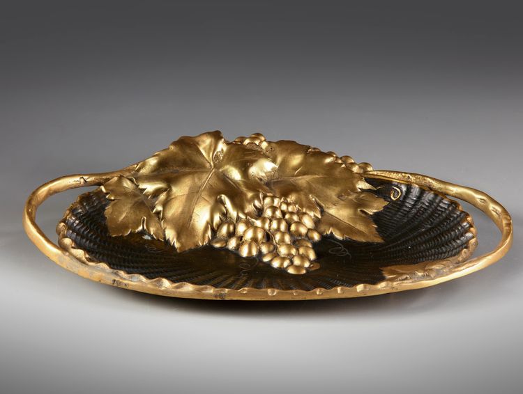 A FRENCH GILT BRONZE 'VIDE POCHE', CIRCA 1900