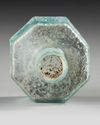 A MOLDED HEXAGONAL GLASS BOTTLE, 7TH–9TH CENTURY