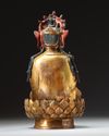 A  Chinese gilt-bronze figure of Avalokitesvara