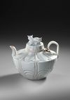 A CHINESE QINGBAI RECUMBENT CATS EWER AND COVER, NORTHERN SONG DYNASTY (960–1127)