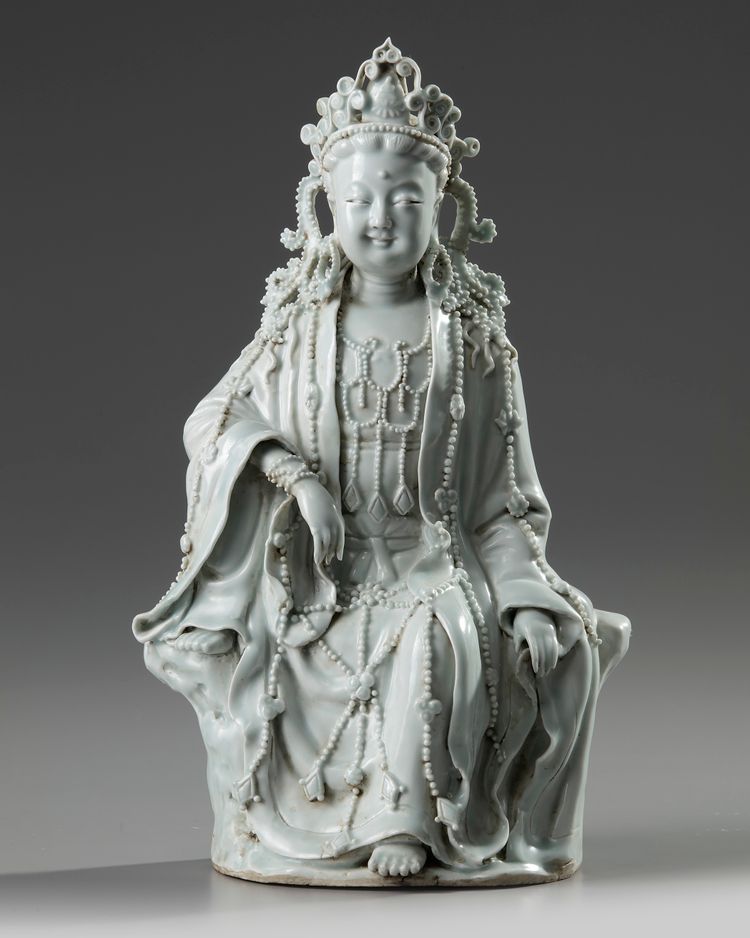 A Chinese Qingbai-glazed figure of Guanyin