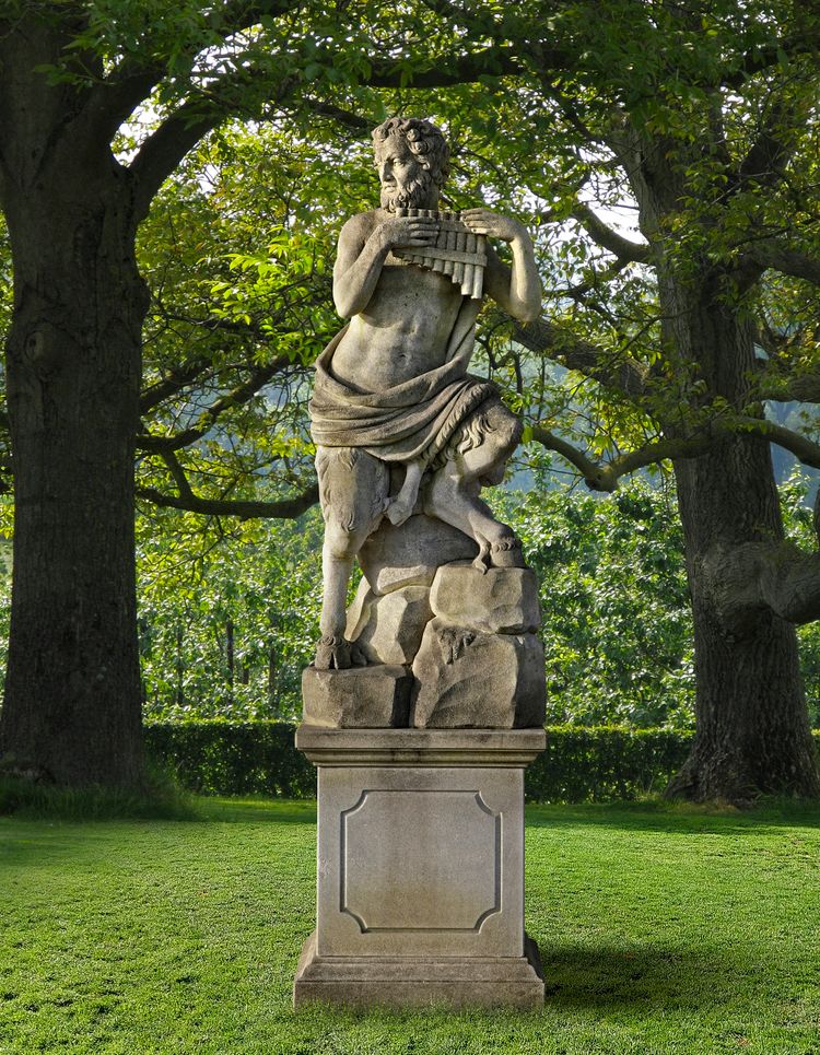 A SCULPTED LIMESTONE GARDEN MODEL OF PAN, SECOND HALF 20TH CENTURY