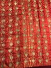 AN OTTOMAN EMBROIDERED DEEP RED SILK PANEL