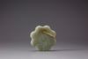 A celadon jade floral plaque
