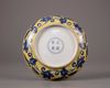 A Chinese yellow ground blue and white 'gardenia' dish