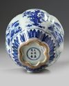 A CHINESE BLUE AND WHITE LOBED JAR, QING DYNASTY (1644-1911)