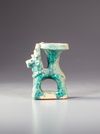 A KASHAN TURQUOISE GLAZED POTTERY OIL LAMP , PERSIA , 13TH CENTURY