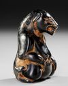 A CARVED HARDWOOD BEAR, CHINA, HAN DYNASTY (206 BC– 220 AD)