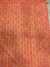 A LARGE EMBROIDERED DEEP RED BEDSHEET, INDIA,19TH CENTURY