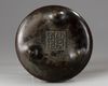 A Chinese bronze tripod censer