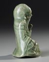 A CHINESE CELADON FIGURE CENSER,  MING DYNASTY, 15TH CENTURY