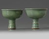 A SIMILAR PAIR OF CHINESE CELADON GLAZED STEMCUPS, LATE YUAN, EARLY MING DYNASTY, 14TH CENTURY