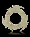 A LIGHT CELADON CHINESE JADE XUANJI, SHANG DYNASTY (c. 1600–1046 BC)