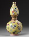 A CHINESE FLOWER ROUNDEL DOUBLE GOURD VASE